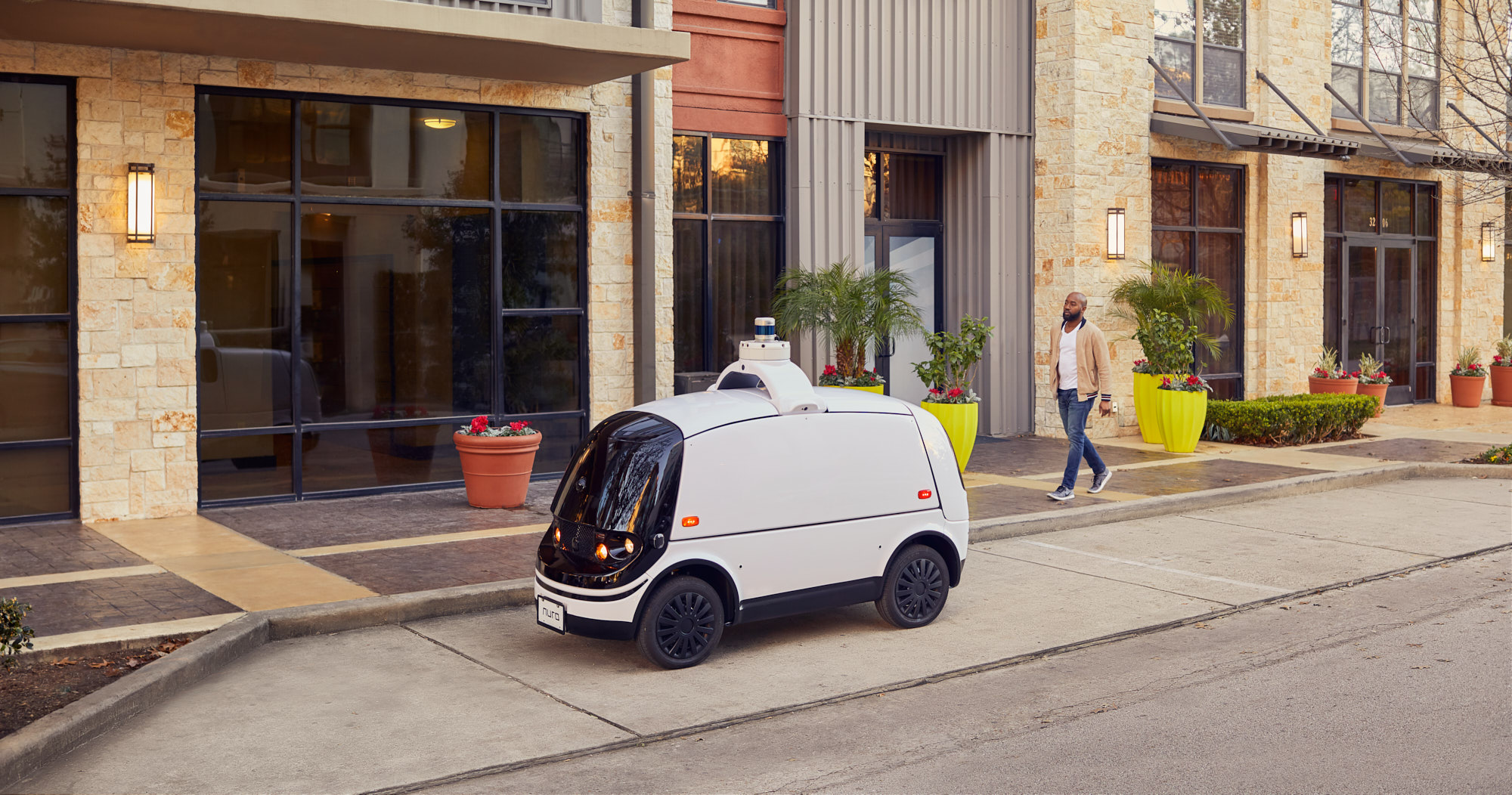 Driverless Vehicle with Man and Sidewalk | Brand Lifestyle Photography