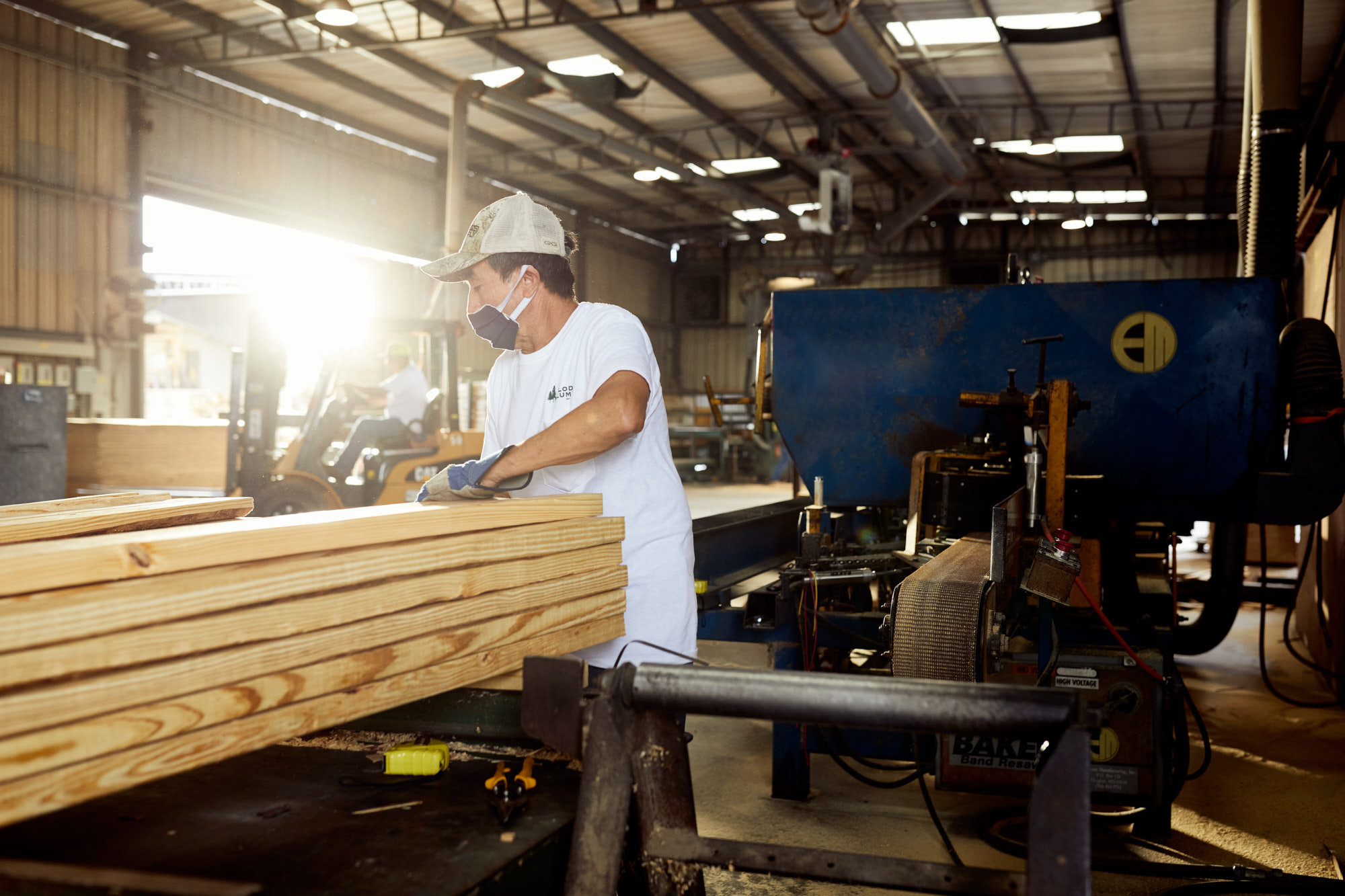 Worker with Lumber | Industrial Photography